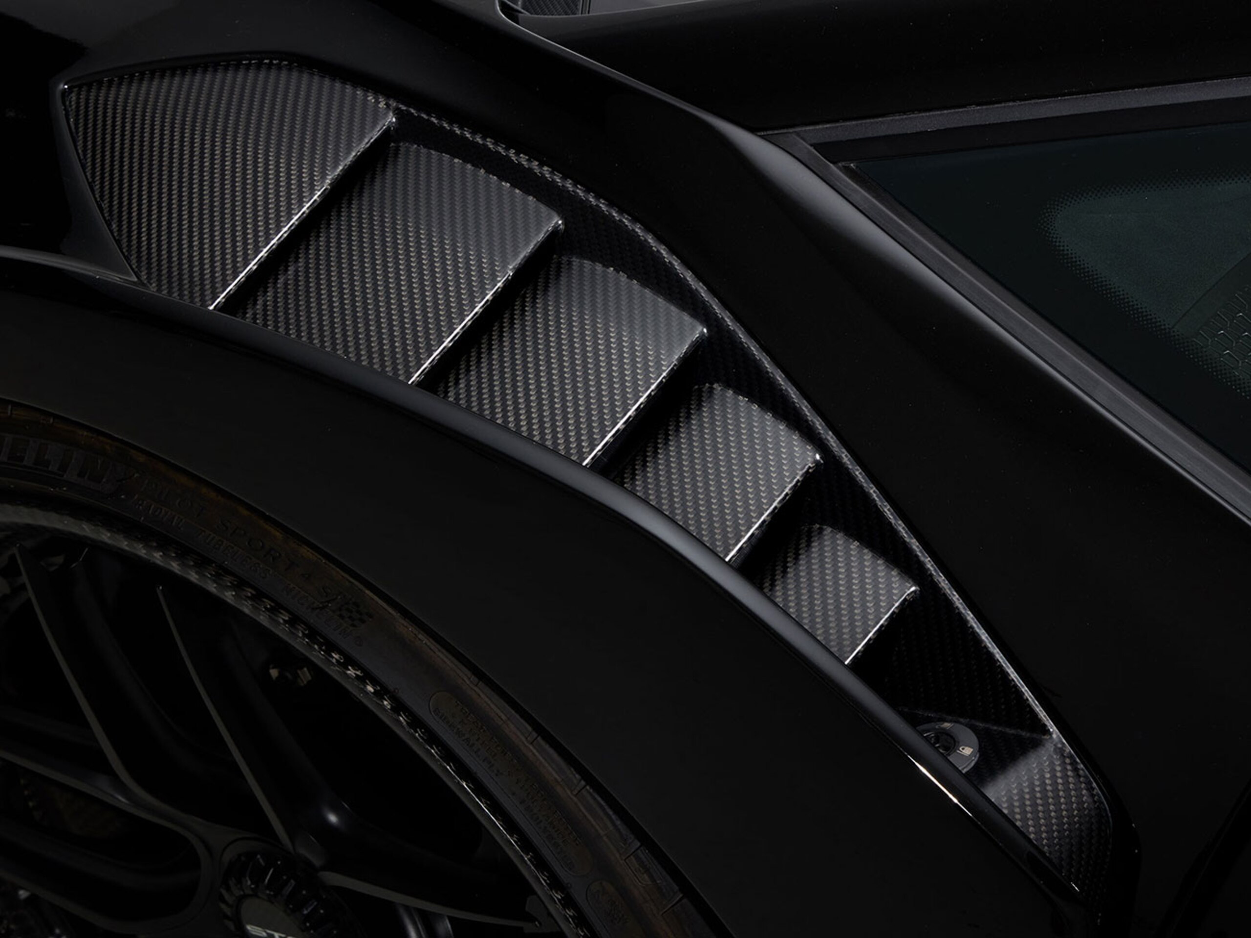 2022 Lamborghini Huracán STO — Photo 12 / 43